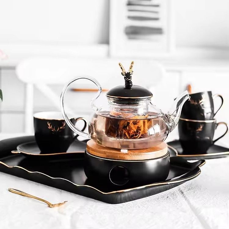 Modern black gift box luxury porcelain cup saucer heating base sets ceramic tea set with glass teapot