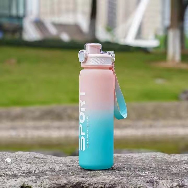 Fitness gym outdoor sport portable plastic water cup 1000ml gradient color bounce water bottle