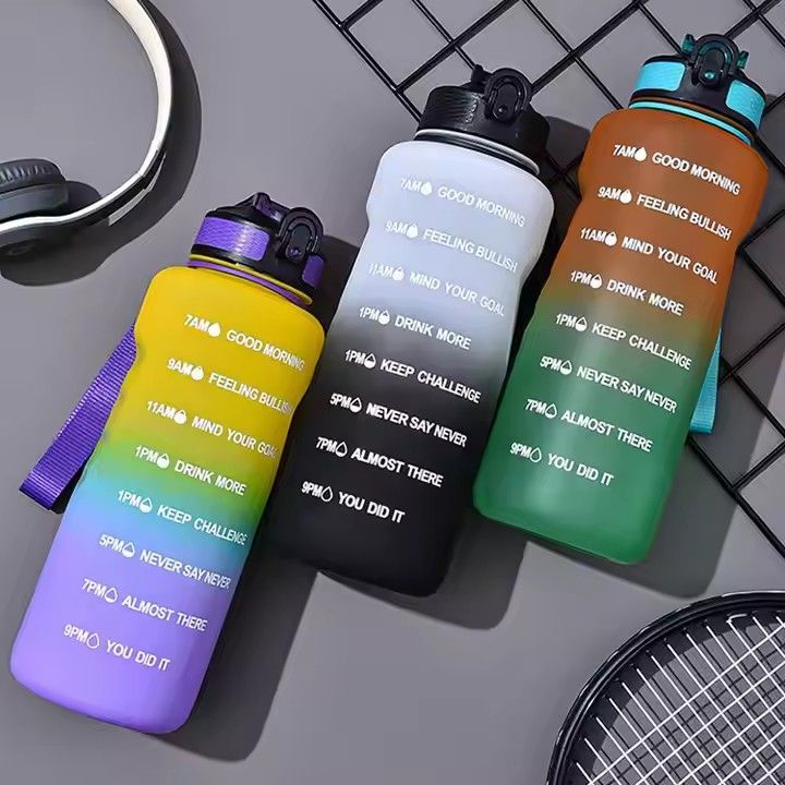 Fitness tritan bpa free plastic protein bottle custom logo 50oz 1500ml motivational water bottle for sport