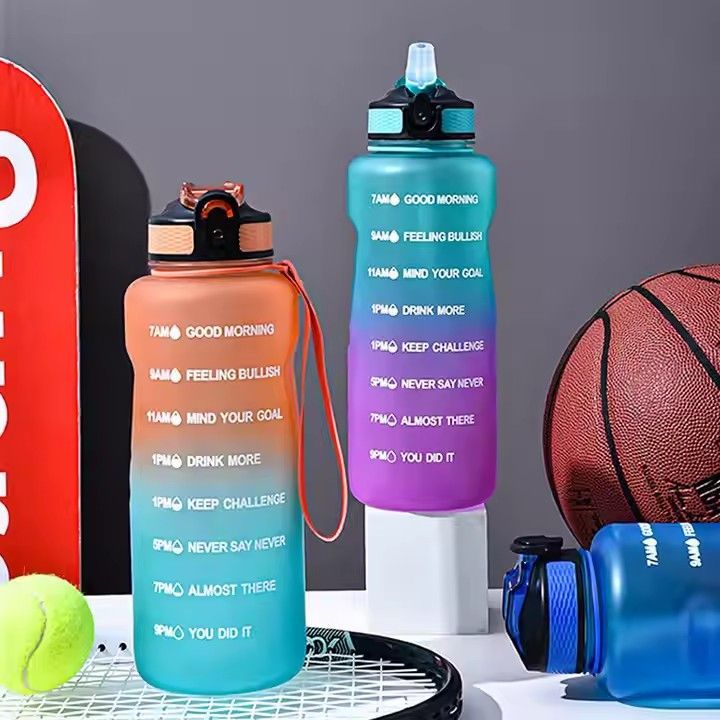 Fitness tritan bpa free plastic protein bottle custom logo 50oz 1500ml motivational water bottle for sport